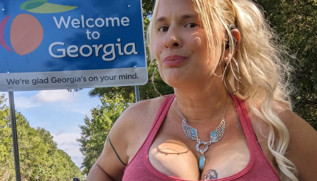 Queen Daisy Chain, Pec Flex Muscle Mommy at the Florida-Georgia state line