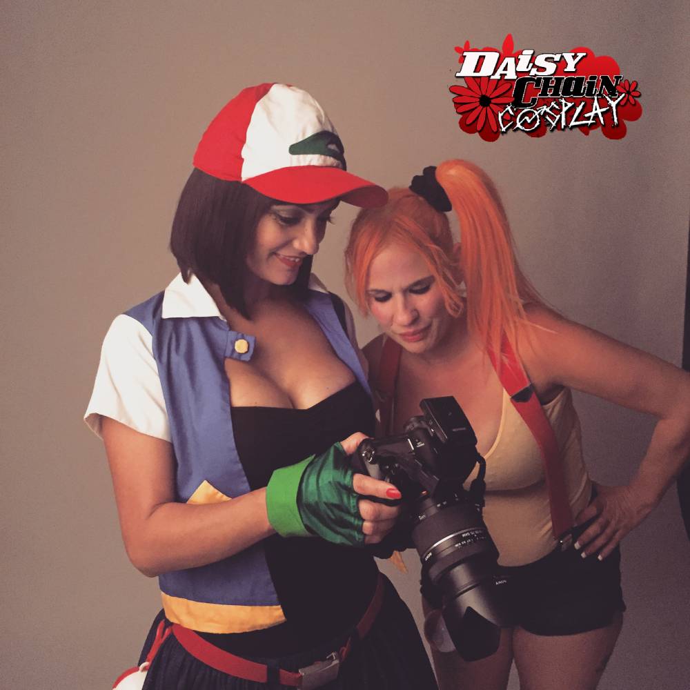 Misty and Ash Cosplay - Ivy Cosplay and Daisy Chain Cosplay behind the scenes looking at a camera